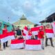 Kobarkan Semangat Kemerdekaan, PKT Bagikan 50 Bendera Merah Putih di Loktuan